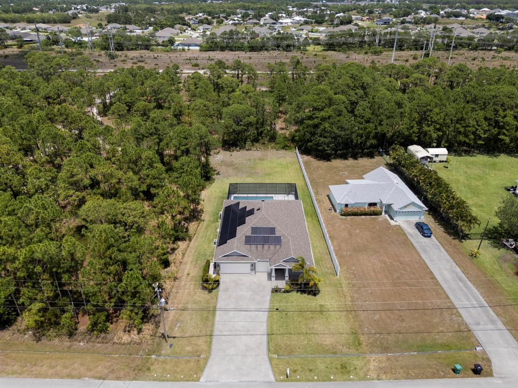 Photo of 5921 NW Wesley Road, Port Saint Lucie, FL 34986 (MLS # R11089117)