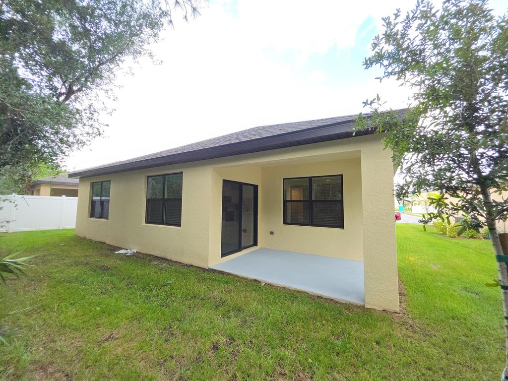 Photo of 489 Sea Spray Dr, Fort Pierce, FL 34945 (MLS # R11129463)