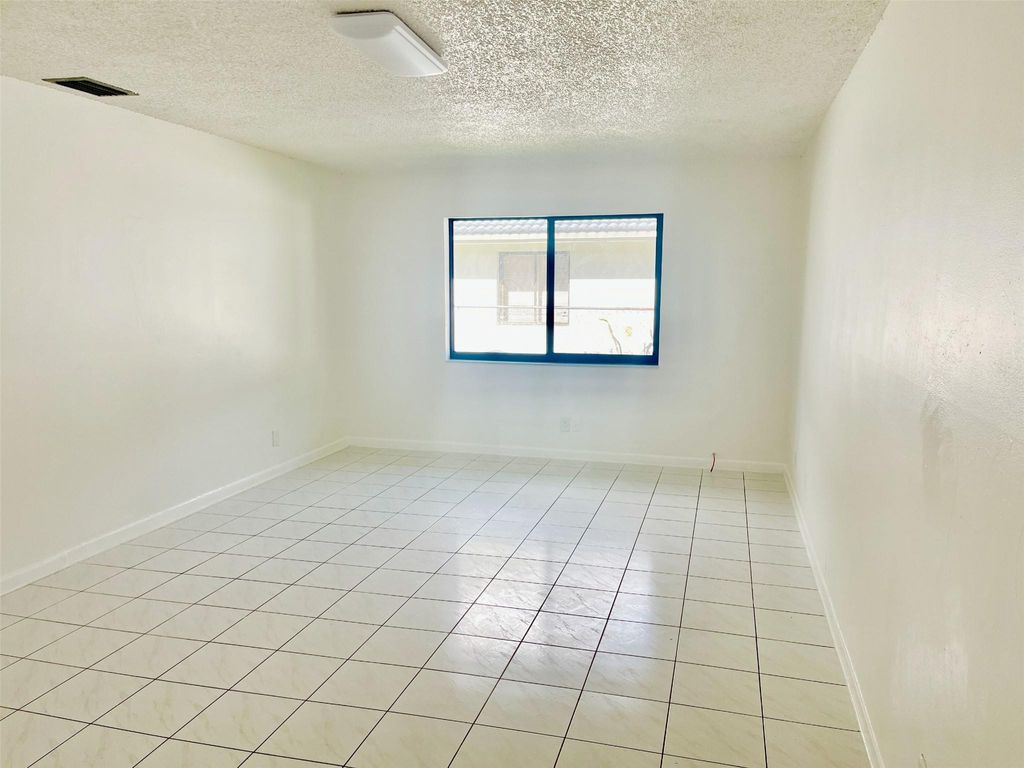 Photo of 4104 NW 114th Avenue, Coral Springs, FL 33065 (MLS # F10548393)