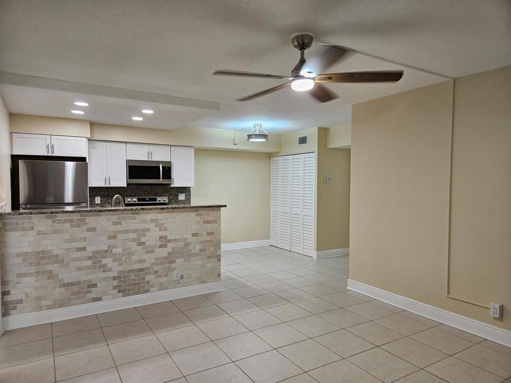 Photo of 6499 Chasewood Drive #C, Jupiter, FL 33458 (MLS # R10872746)