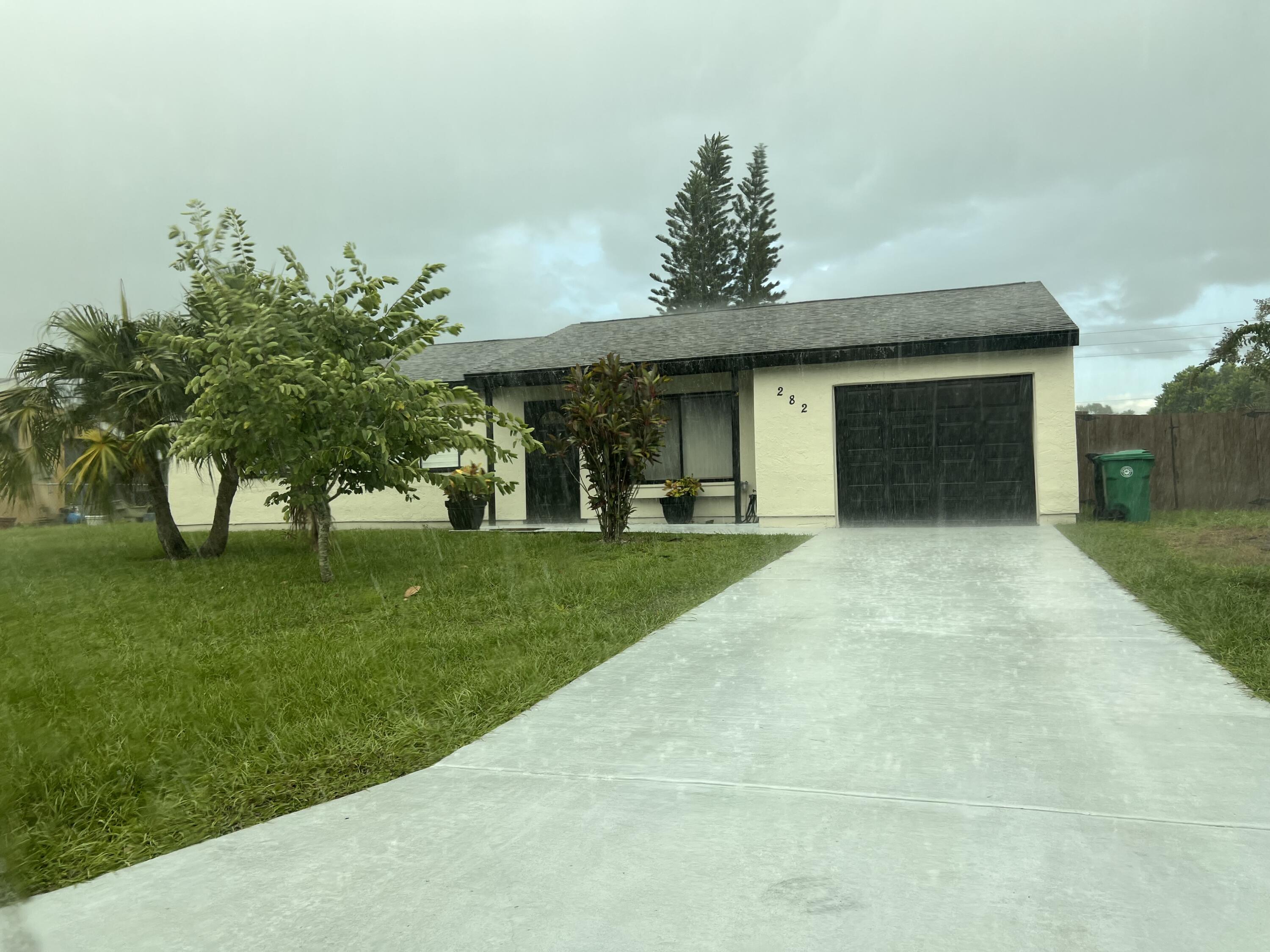 Stainless Steel Appliance, Ceiling Fans, Remodeled Bathrooms and screened porch. Great Location in Port St Lucie!credit application link:https://apply.link/NBN7tPU