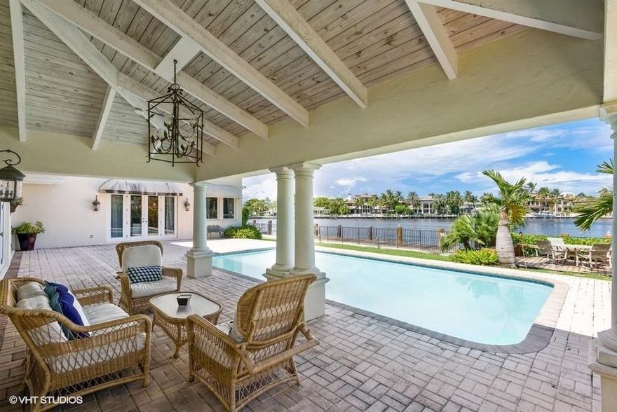 Stunning, unobstructed views as you enter this home across the bay looking north to Bahia Mar Yacht Basin. Private location on Isla Bahia Drive. CBS construction of the second floor renovation in 2001 featuring two Master Suites located on first and second floor. Spacious open floor plan with 100 feet of dockage. Neighborhood offers high elevation in land, wide turning basins, marina, beach club and security with ocean access for your yacht just minutes away. A pleasure to show!