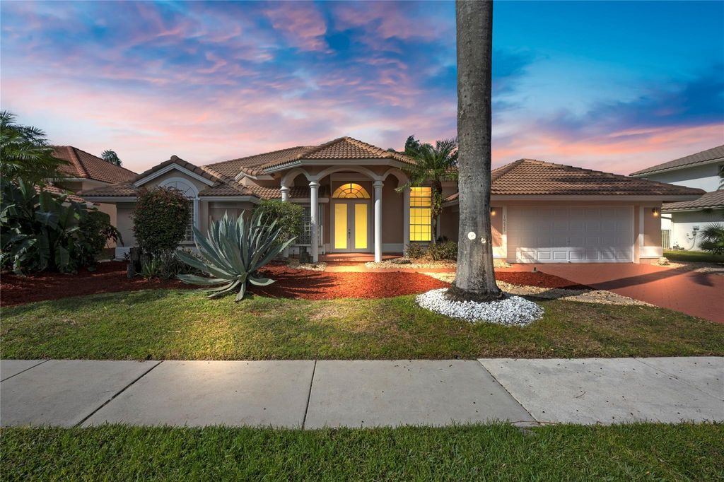 Photo of 10625 Maple Chase Drive, Boca Raton, FL 33498 (MLS # F10477065)