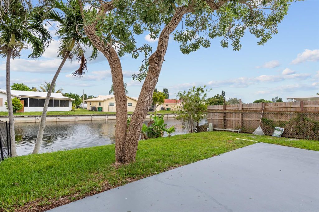 Photo of 7656 NW 73rd Terrace, Tamarac, FL 33321 (MLS # F10554215)