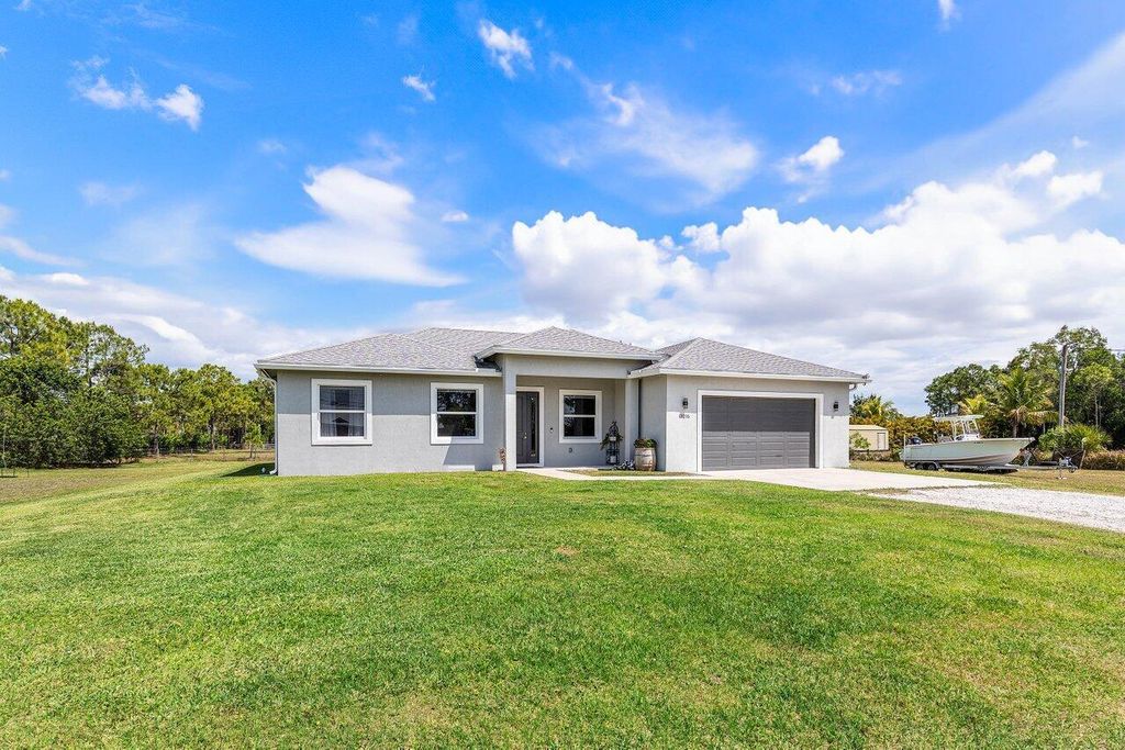 Photo of 13215 75th Lane N, West Palm Beach, FL 33412 (MLS # R11079397)