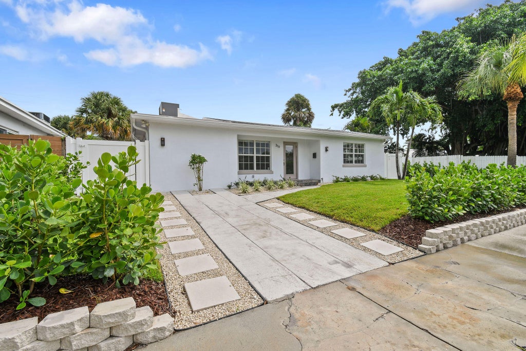 Photo of 319 29th Street, West Palm Beach, FL 33407 (MLS # B26062898)