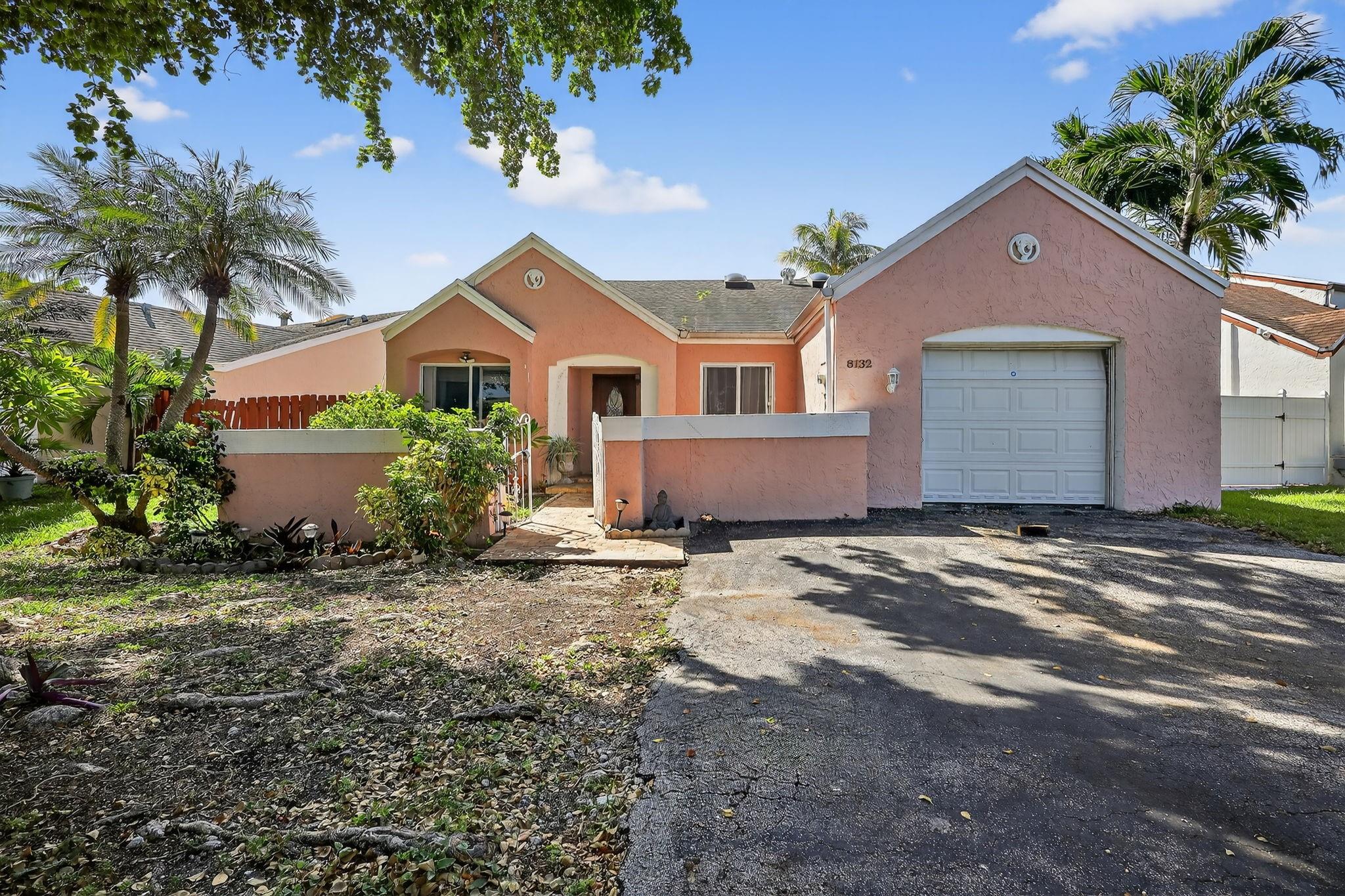 Lakefront beauty in Lakes of Avalon. Enjoy stunning water views and sunsets from your private backyard. This 3 bedroom, 2 bathroom home includes a flex room ideal for an office, gym, or playroom. Vaulted ceilings and natural light create a bright, open feel. Elegant wood and tile flooring throughout. The oversized primary suite features two large closets and an ensuite bath with walk-in shower, skylight, and double vessel vanity. Kitchen offers 42-inch wood cabinets, granite countertops, and ample storage. Roof and AC replaced in 2019. Impact windows and doors also installed in 2019. Located on a cul-de-sac near top-rated schools, shopping, dining, and major highways.