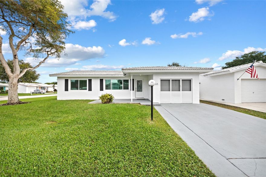 Located in Lauderdale West, an established 55+ community, this move-in-ready home offers a peaceful retreat from the energy of South Florida (Don't miss the 3D tour!). Situated on a bright corner lot, the residence features 2 bedrooms and 2 bathrooms, updated wood-look tile flooring, hurricane-impact windows, a renovated kitchen, and a garage equipped with split A/C. The community is exceptionally well managed, with a full calendar of social events and activities throughout the year. Simply move in and enjoy. Please note: pets are not permitted, and financed purchases require 20% down and a minimum 720 credit score.