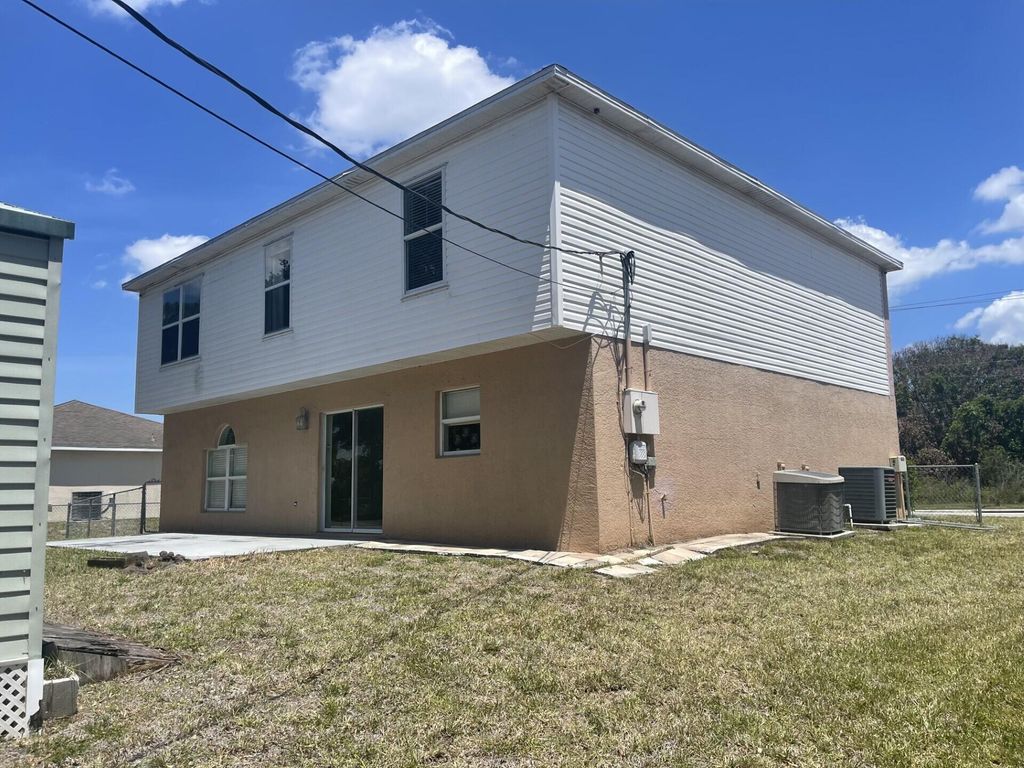 Photo of 1994 SE Floresta Drive, Port Saint Lucie, FL 34983 (MLS # B26022903)