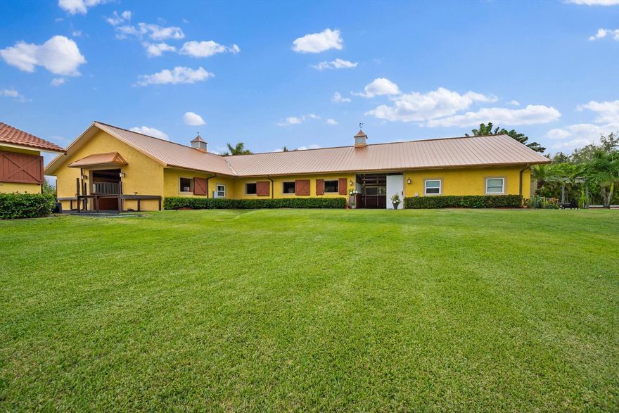 10 dry stalls available in the gated, natural community of Homeland. This lovely barn sits on 5 acres with trails accessible behind the 115 x 200 ft. sand ring with auto irrigation. Stalls are 12 x 12 in the main barn that includes a feed, tack, and restroom. Property features five oversized grass paddocks, jumps, and newly improved wash racks. You will find this location very peaceful and serene, surrounded by lush Florida landscaping. Just 4.5 mi. from the south entrance to Wellington International Showgrounds. Available annually, or a 2 month minimum seasonal lease.