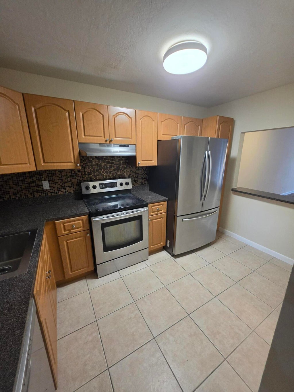 Photo of 120 SPARROW Drive #215, Royal Palm Beach, FL 33411 (MLS # B26082245)