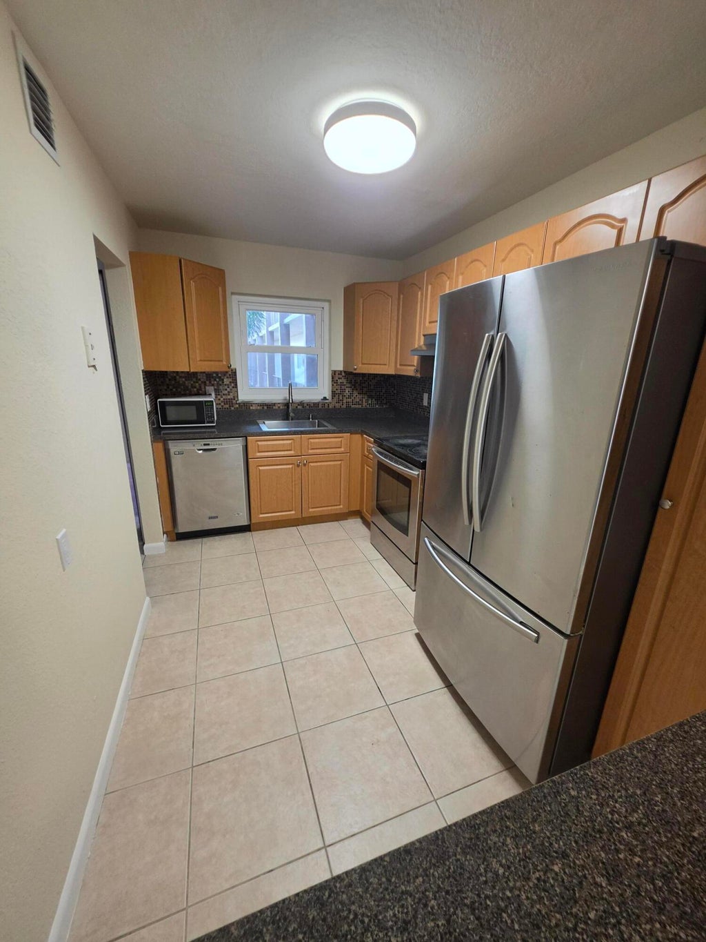 Photo of 120 SPARROW Drive #215, Royal Palm Beach, FL 33411 (MLS # B26082245)