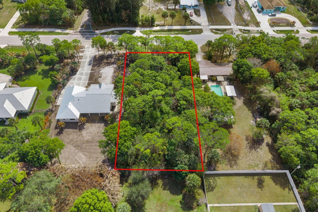Photo of 404 E Midway E Road, Fort Pierce, FL 34982 (MLS # R11165827)