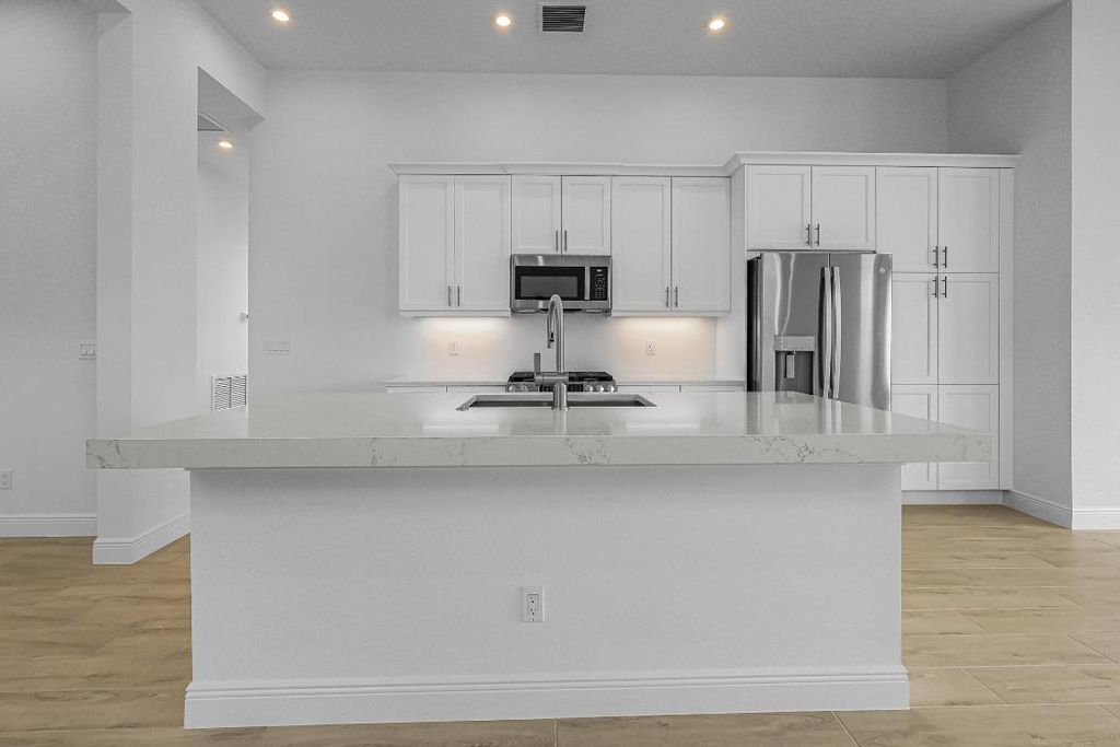 Photo of 213 SE Via Sangro, Port Saint Lucie, FL 34952 (MLS # R11122783)