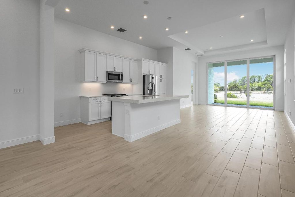 Photo of 213 SE Via Sangro, Port Saint Lucie, FL 34952 (MLS # R11122783)