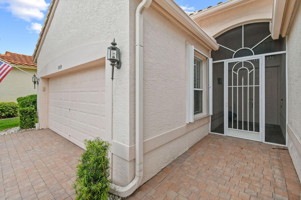 Photo of 309 NW Toscane Trail, Port Saint Lucie, FL 34986 (MLS # R11014848)