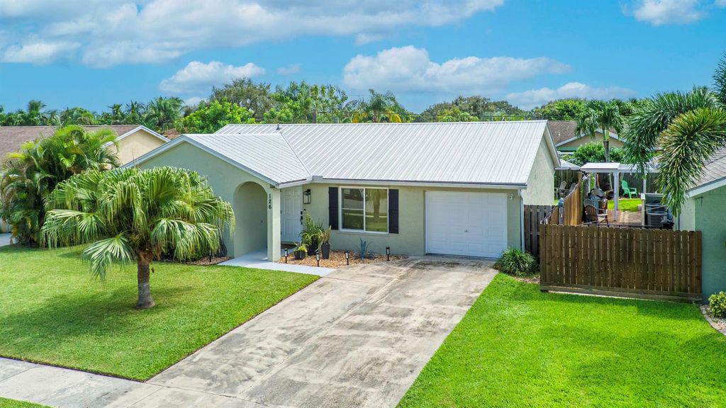 Photo of 126 Banyan Circle, Jupiter, FL 33458 (MLS # R10918335)