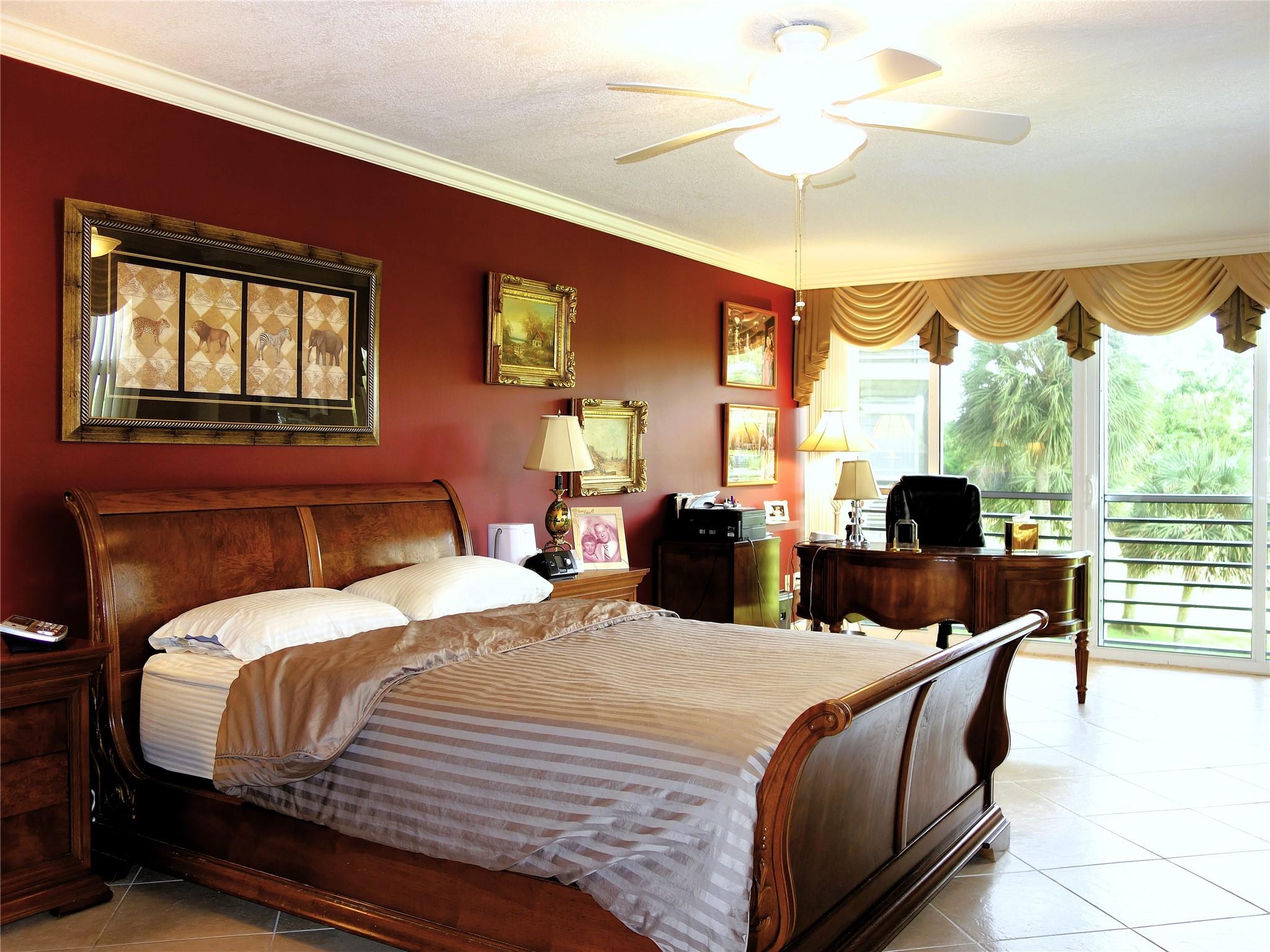 Highly sought-after “King” model with impact windows & accordion shutters. Enjoy panoramic pond & golf views from the enclosed balcony. This remodeled 3BR/2.5BA split-floorplan condo features tile throughout, walk-in closets, W/D in unit, hickory cabinets, and upgraded appliances. Oversized living room fits multiple seating & dining areas. Primary suite includes enclosed impact balcony—ideal for office or sitting area. Condo fee includes cable, internet, water, sewer & trash. 40-year inspection complete. Excellent financials. HWH 2016, HVAC 2013.