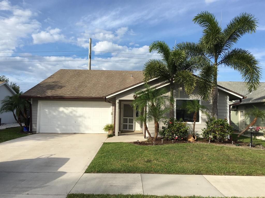 Photo of 6691 SE Raintree Avenue, Stuart, FL 34997 (MLS # R10715307)