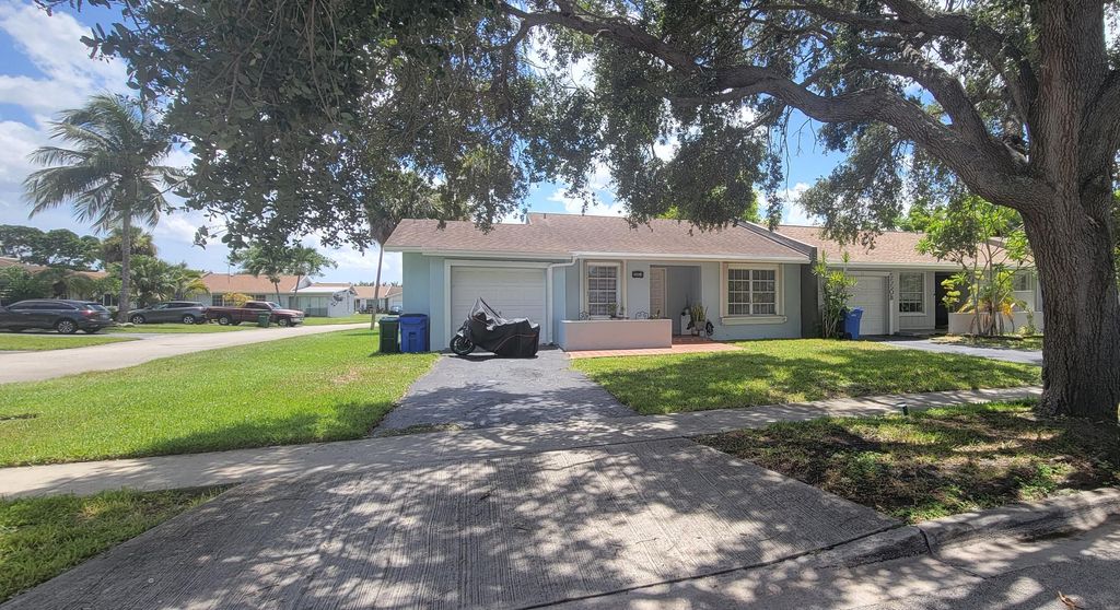 Photo of 5550 Lakewood Circle #A, Margate, FL 33063 (MLS # R11168462)