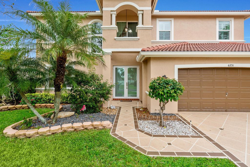 Photo of 6231 Shadow Tree Lane, Lake Worth, FL 33463 (MLS # R11070437)