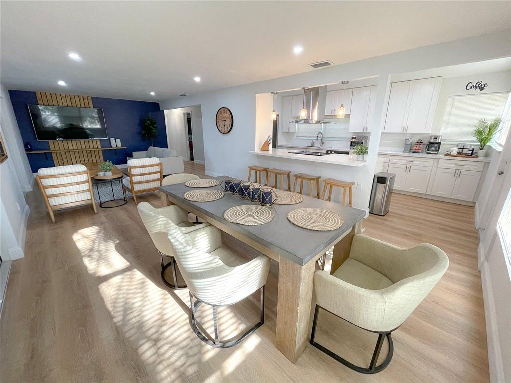 Welcome to your waterfront oasis in the heart of Wilton Manors! This stunning, partially furnished updated 3-bedroom, 2-bathroom home offers the perfect blend of luxury and relaxation. Step inside to discover an inviting open floor plan interior flooded with natural light. The spacious living area is ideal for entertaining. Outside, indulge in the ultimate outdoor experience with an egg swing and a bar where you can mix up your favorite drinks.. Paddleboard/Kayak over the sparkling waters of the canal right in your backyard. With its prime location, this home offers easy access to the vibrant dining, shopping, and entertainment options that Wilton Manors has to offer. Don't miss the opportunity to make this waterfront paradise your own! Lawn care is included!