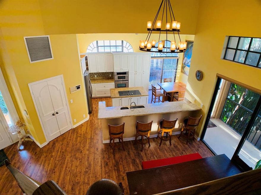 Rare opportunity to own this 3 bed 2.5 bath home in Mariners Cove. One of the lowest priced direct intracoastal homes in the county. Fantastic views up and down the intracoastal with large dockage for up to a 60 foot boat and a jetski..  This is only one of only a few homes in the community with a pool on the water. Come and enjoy the peaceful living in Mariners Cove with access to everything you need within minutes. Check out the 360 pics!