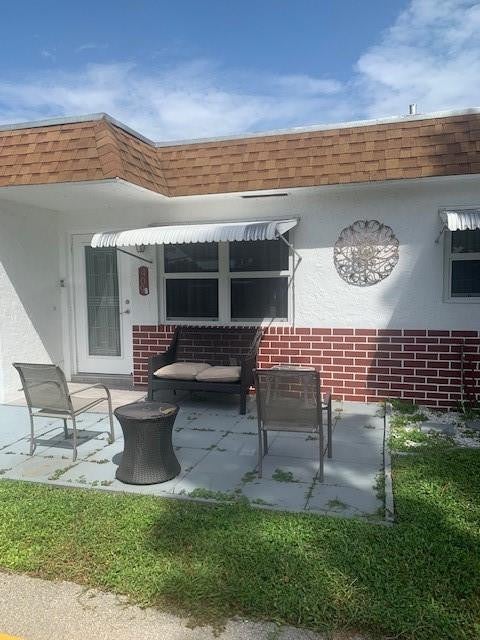 Photo of 409 SW Natura Avenue #B, Deerfield Beach, FL 33441 (MLS # F10466535)