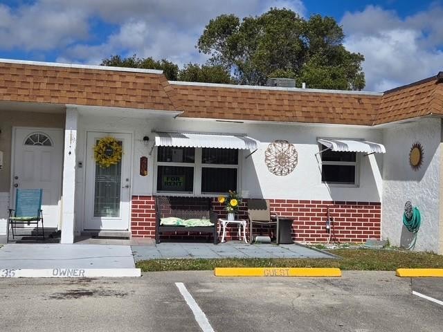 Photo of 409 SW Natura Avenue #B, Deerfield Beach, FL 33441 (MLS # F10466535)