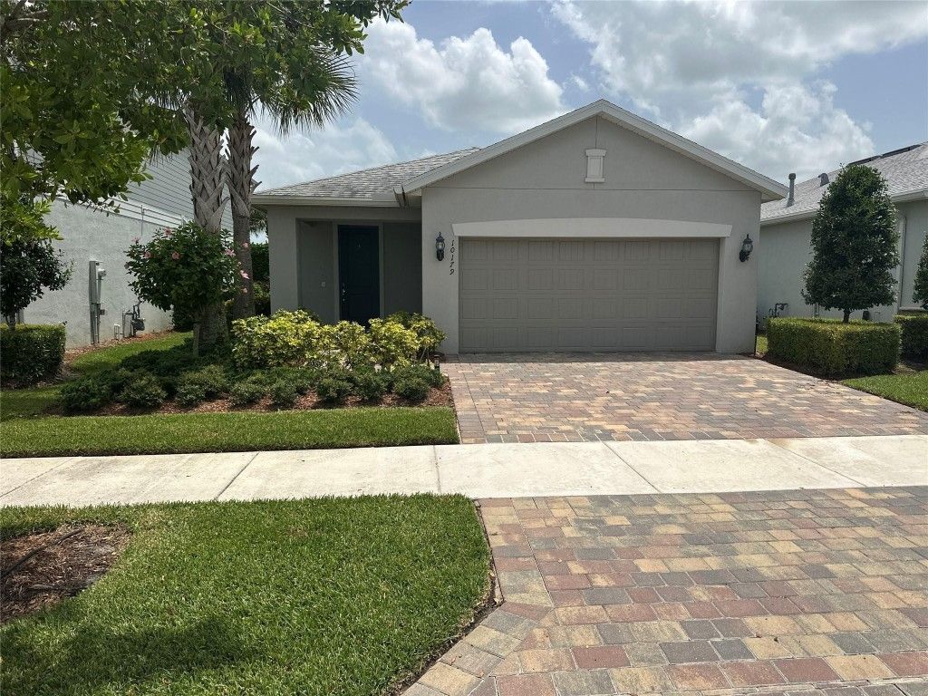 Photo of 10179 SW Captiva Drive, Port Saint Lucie, FL 34987 (MLS # F10514555)