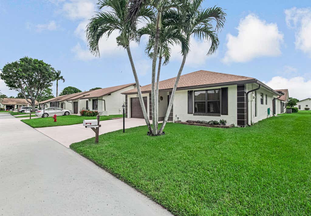 Photo of 6210 Olivewood Circle, Greenacres, FL 33463 (MLS # B26064458)