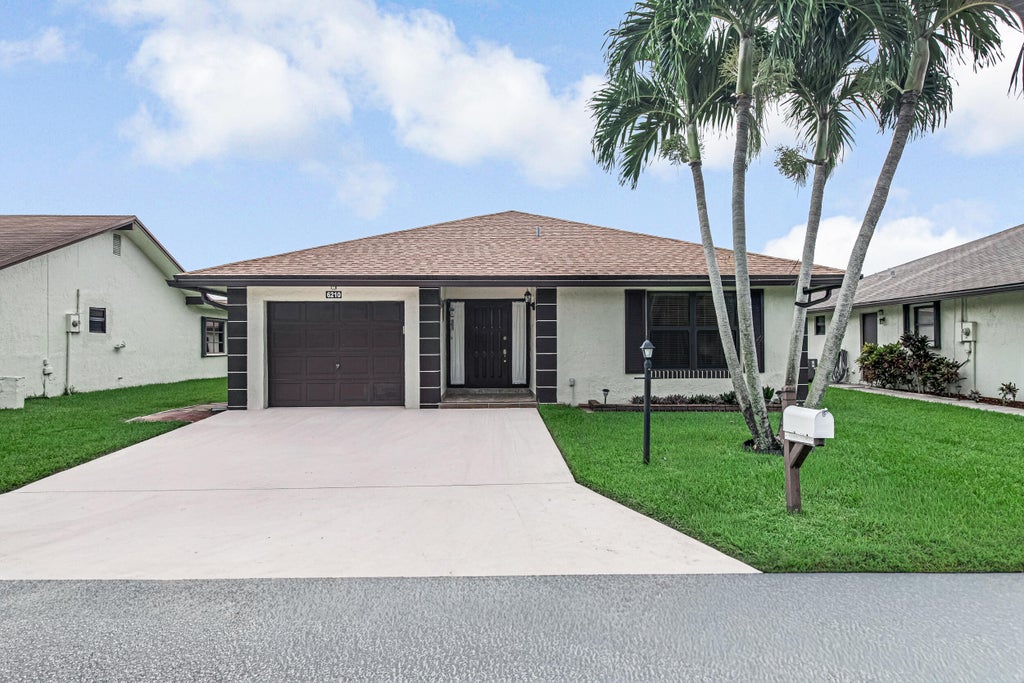 Photo of 6210 Olivewood Circle, Greenacres, FL 33463 (MLS # B26064458)