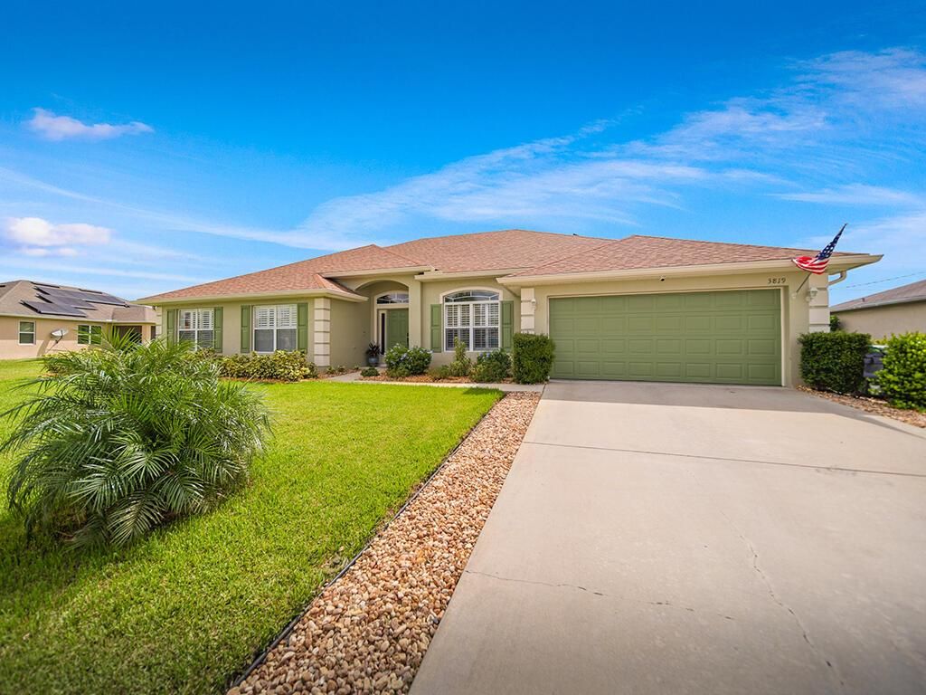 Photo of 3819 SW Kasin Street, Port Saint Lucie, FL 34953 (MLS # R10966958)