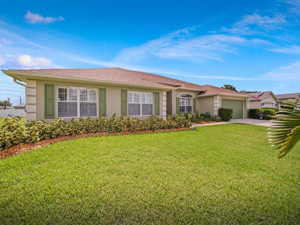 Photo of 3819 SW Kasin Street, Port Saint Lucie, FL 34953 (MLS # R10966958)