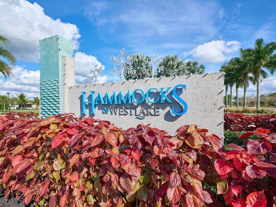 Experience refined Florida living in the highly sought-after Hammocks of Westlake, where modern luxury meets resort-style amenities and natural beauty. This exceptional 3-bedroom, 3-bath residence with a private den/office welcomes you with a grand foyer entrance and an elegant, light-filled interior designed for both comfort and sophistication. Designed for both refined entertaining and everyday living, the home features a formal dining room ideal for hosting elegant gatherings, along with a spacious gathering room that serves as the heart of the home.