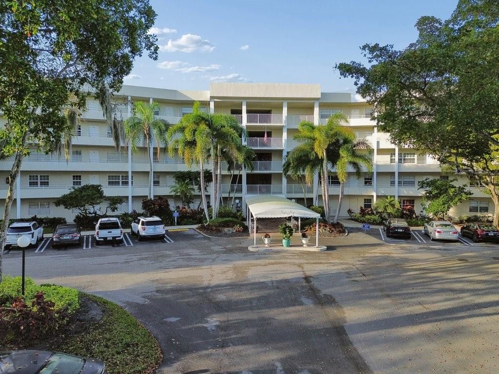 Photo of 821 Cypress Boulevard #408, Pompano Beach, FL 33069 (MLS # F10546585)