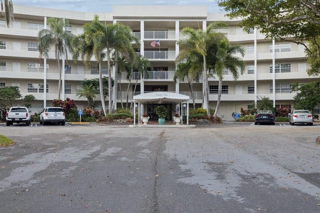 Photo of 821 Cypress Boulevard #408, Pompano Beach, FL 33069 (MLS # F10546585)