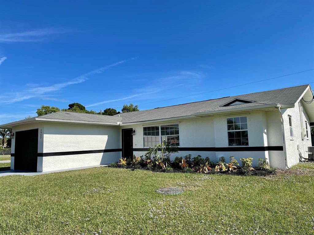 Photo of 1957 SE Mandrake Circle, Port Saint Lucie, FL 34952 (MLS # R10755953)