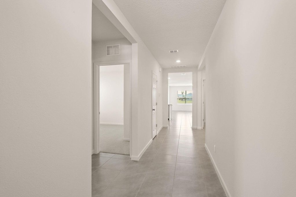 Photo of 9809 SW Triton Way, Port Saint Lucie, FL 34987 (MLS # R10981573)