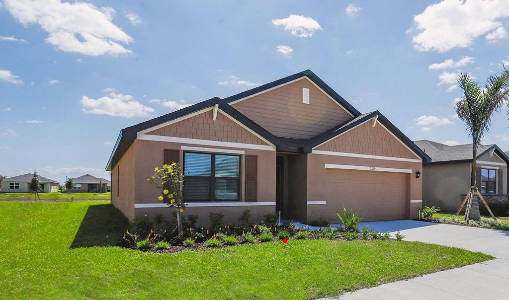 Photo of 9809 SW Triton Way, Port St Lucie, FL 34987 (MLS # R10981573)