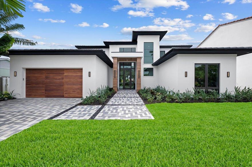 This new construction contemporary home designed and built by Sam Fisch Development is one of five beautiful new homes coming to Ellamar Road in the desirable SoSo neighborhood. The home has 5 bedrooms, 4 bathrooms, and 4,540 sq ft of indoor and outdoor living on a ~10,000 sq ft lot. The first floor primary bedroom and open-concept great room look out onto the saltwater pool and spa with plenty of green space to enjoy. The entertainer's kitchen includes an oversized island and walk-in pantry, and steps out onto the loggia complete with an outdoor kitchen and lots of space for outdoor dining and entertaining.