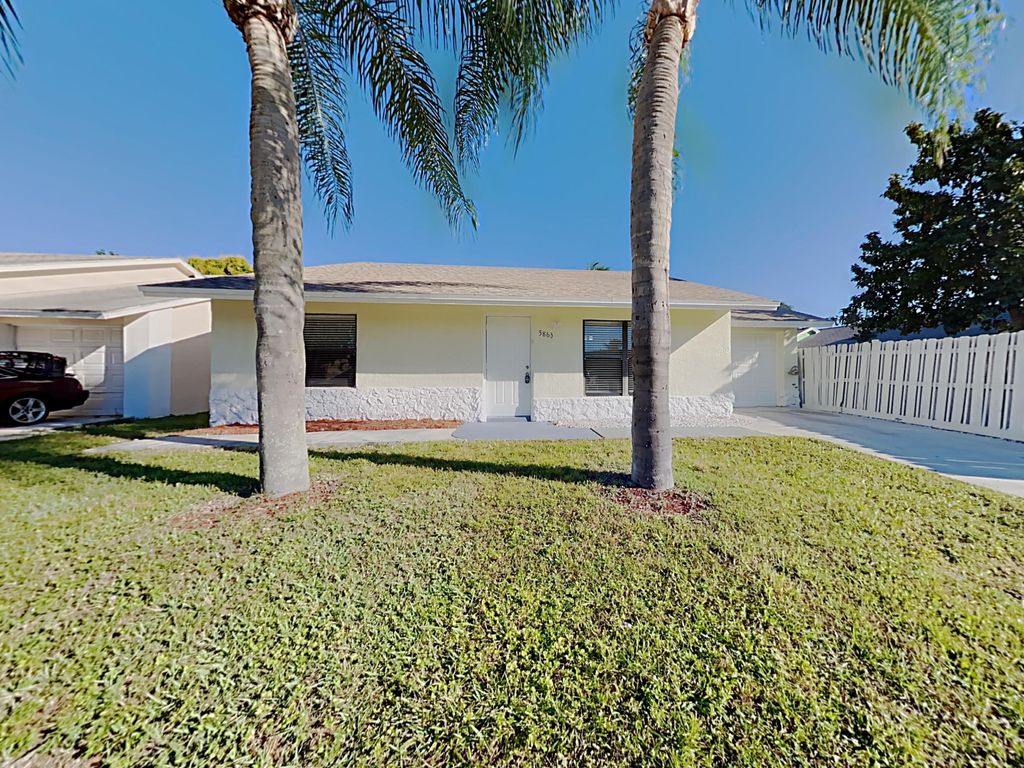 Photo of 5863 Triphammer Road, Lake Worth, FL 33463 (MLS # B26022417)