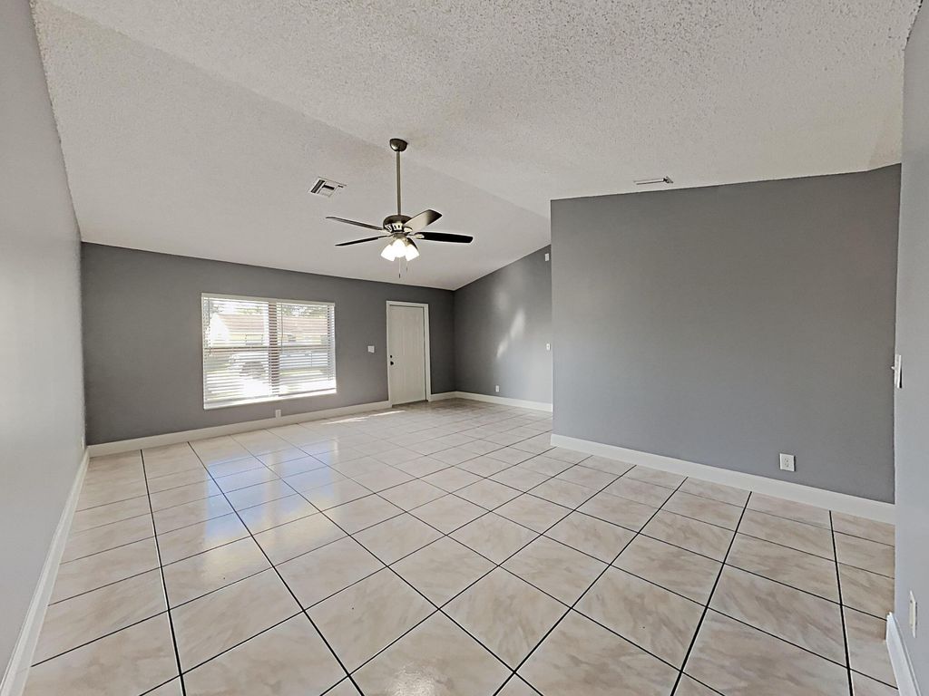 Photo of 5863 Triphammer Road, Lake Worth, FL 33463 (MLS # B26022417)