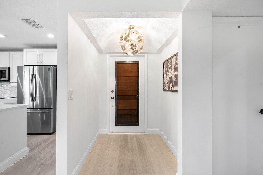 Photo of 160 Brackenwood Road, Palm Beach Gardens, FL 33418 (MLS # R10923787)