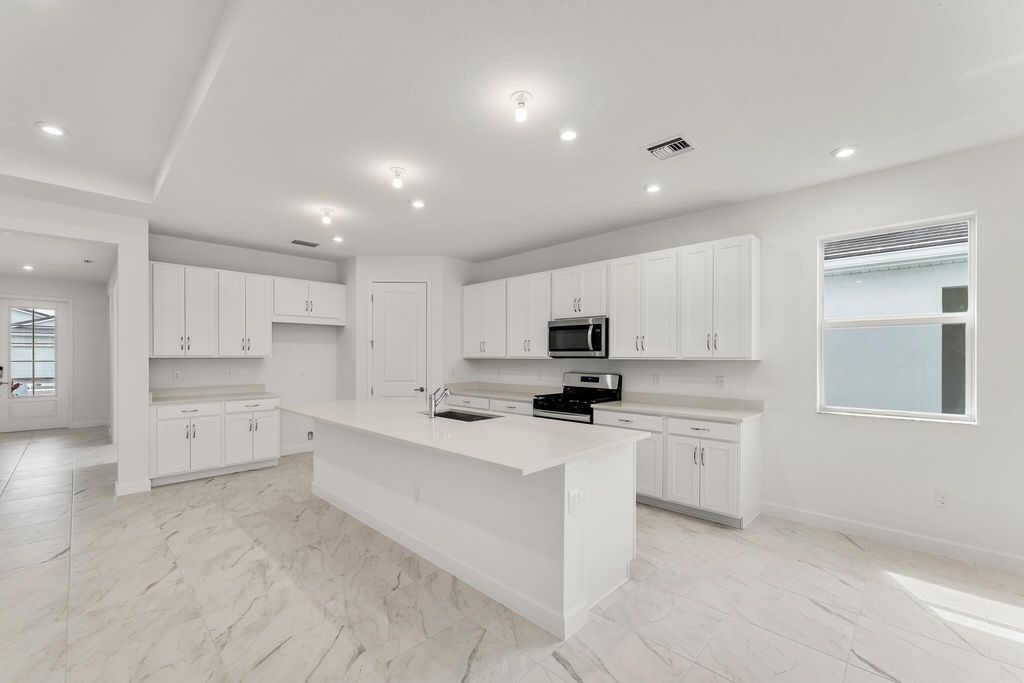 Photo of 10136 SW Carnelian Street, Port Saint Lucie, FL 34987 (MLS # R11087079)