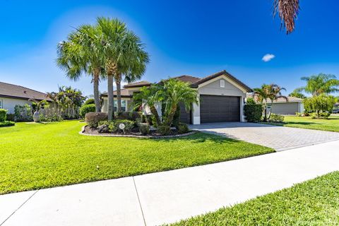 Photo of 11402 SW Half Moon Lake Lane, Port Saint Lucie, FL 34987 (MLS # B26019099)