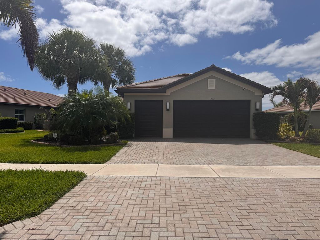 Photo of 11402 SW Half Moon Lake Lane, Port Saint Lucie, FL 34987 (MLS # B26019099)