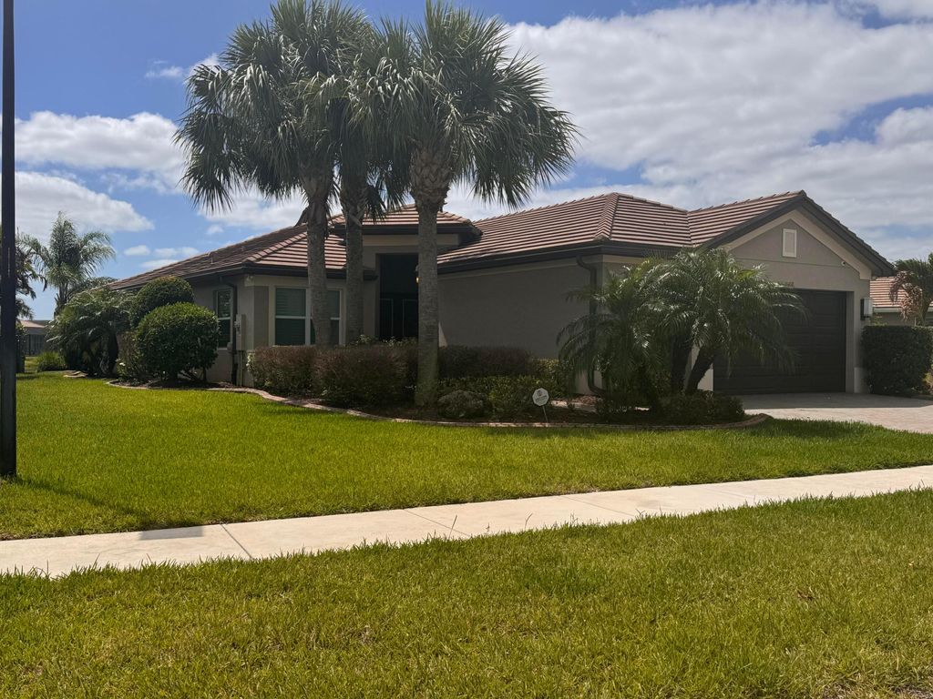 Photo of 11402 SW Half Moon Lake Lane, Port Saint Lucie, FL 34987 (MLS # B26019099)