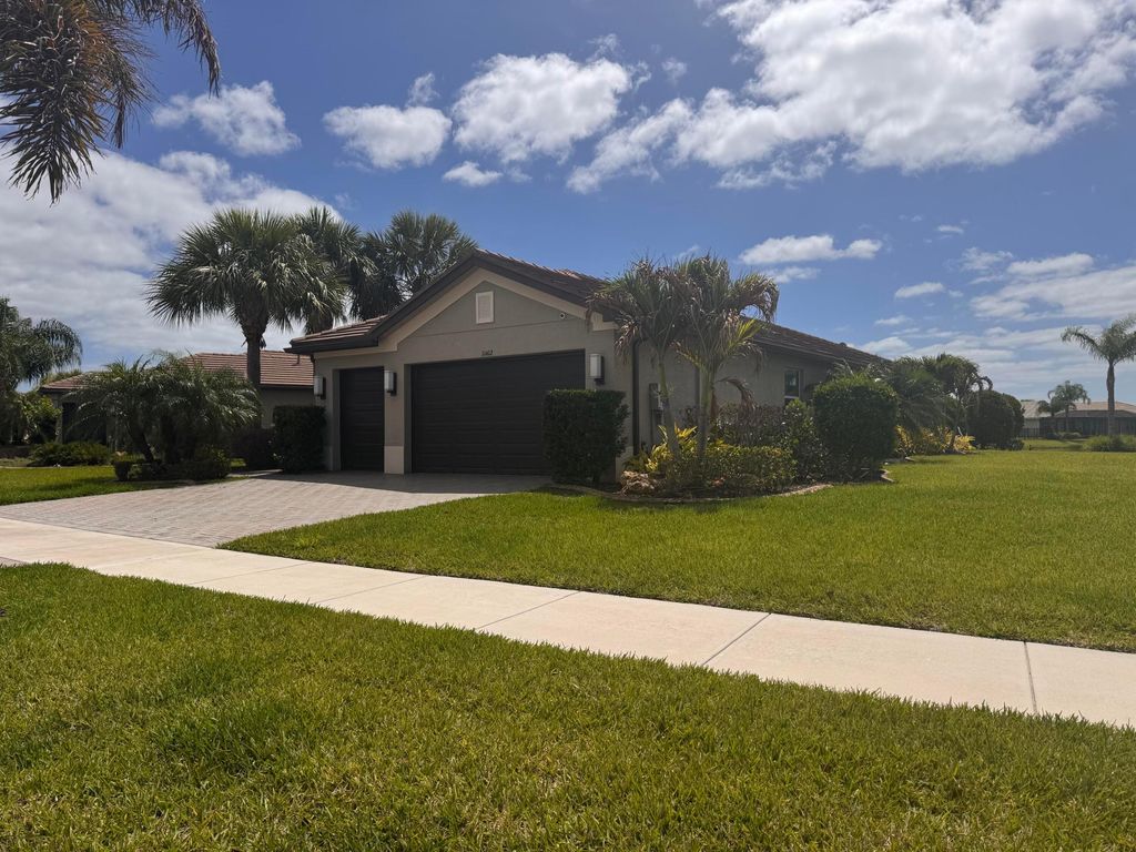 Photo of 11402 SW Half Moon Lake Lane, Port Saint Lucie, FL 34987 (MLS # B26019099)