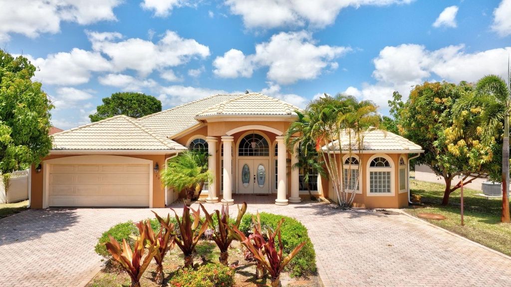 Photo of 501 SW McComb Avenue, Port Saint Lucie, FL 34953 (MLS # F10501234)